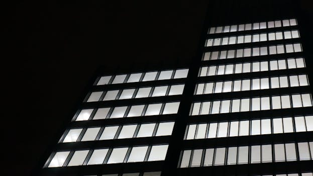 Low Angle View of Office Building Against Sky